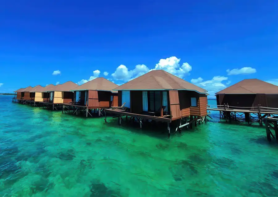 Sea Star Resort overwater villas above the calm waters of the Semporna